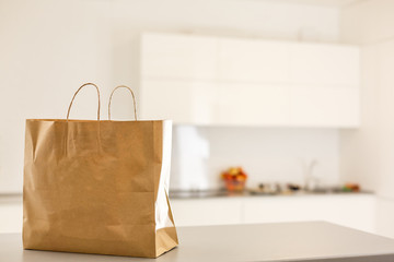 Paper bag on the kitchen table