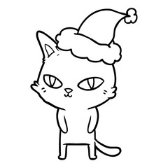 line drawing of a cat with bright eyes wearing santa hat