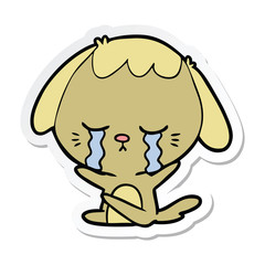 sticker of a cartoon dog crying