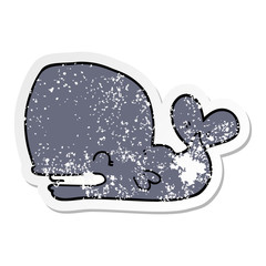distressed sticker of a cartoon whale
