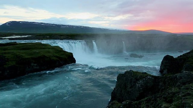 The rapid flow of water powerful Godafoss cascade. Location place Bardardalur valley of Iceland.