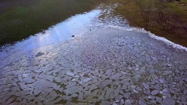 Ice blocks in small lake