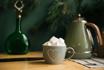 beautiful light cup with a heart and cubes of sugar, a pleasant pastime
