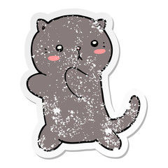distressed sticker of a cute cartoon cat