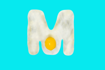 Fried egg in the shape of the letter N