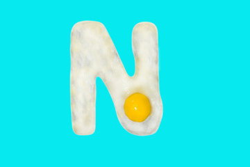 Fried egg in the shape of the letter N