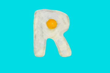 Fried egg in the shape of the letter R