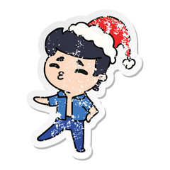 christmas distressed sticker cartoon of kawaii boy