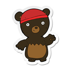 sticker of a cartoon black bear wearing hat