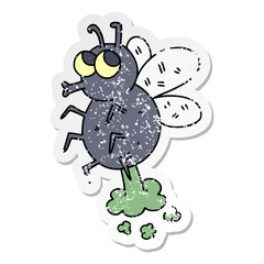 distressed sticker of a quirky hand drawn cartoon fly