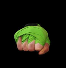 Hand giving a fist bump with boxing straps