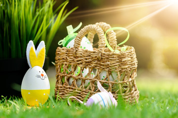 Decorative eggs on green grass for Easter celebration