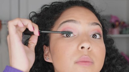 beautiful teenage girl vlogger filming makeup tutorial sharing beauty video enjoying social media influencer recording vlog at home