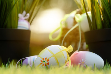 Decorated Eggs lay on grass prepared for Easter celebration