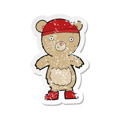 retro distressed sticker of a cartoon teddy bear