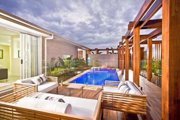 Wood decorated swimming pool area with swimming pool