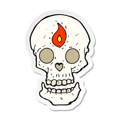 sticker of a cartoon mystic skull