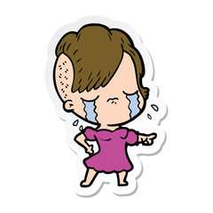 sticker of a cartoon crying girl