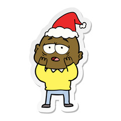 sticker cartoon of a tired bald man wearing santa hat