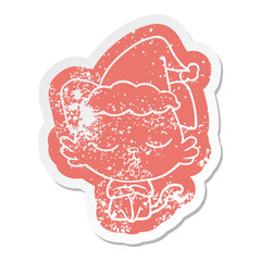 cute cartoon distressed sticker of a dog wearing santa hat