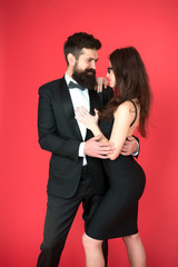 Elegance is not about being noticed. Award ceremony concept. Bearded man wear suit girl elegant dress. Formal dress code. Visiting event or ceremony. Couple ready for award ceremony. Corporate party