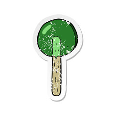 retro distressed sticker of a cartoon lollipop