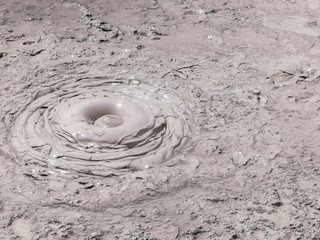 close up shot of thick boiling mud pool near rotorua