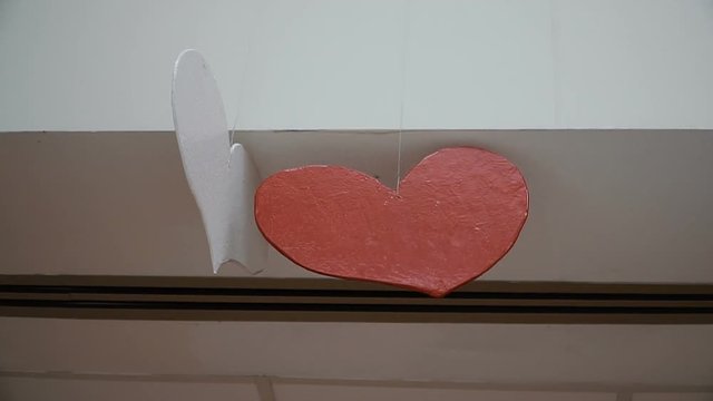 Red heart hanging on the ceiling
