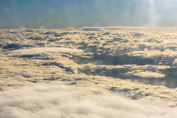 View on white clouds from the airplane window