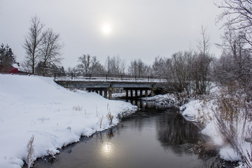 a small river in winter is not frozen. winter landscape. snow picture. winter outside