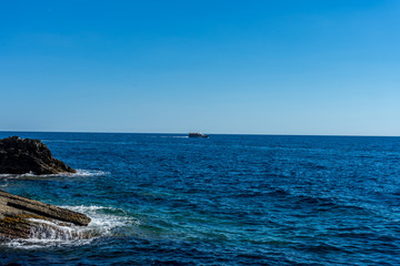 Italy, Cinque Terre, Vernazza, a body of water next to the ocean