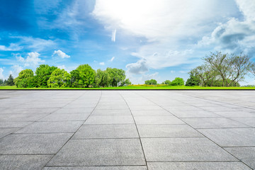 Empty square floor and green forest in summer season