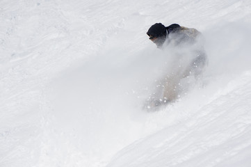 Fast Snowboarder Sprays Snow in a Crash