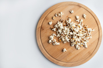 Popcorn in bowl on white background