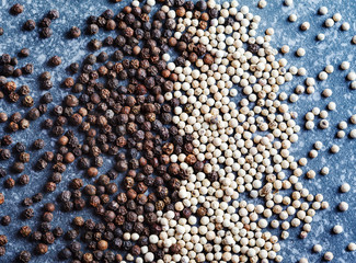 White and black peppers