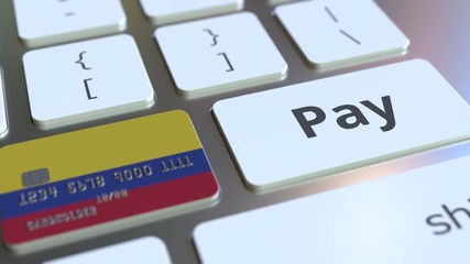Bank card featuring flag of Colombia as a key on a computer keyboard. Colombian online payment conceptual animation - Powered by Adobe