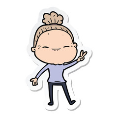 Obraz premium sticker of a cartoon peaceful old woman