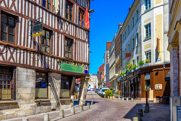 Fototapeta na wymiar Cozy street with timber framing houses in Rouen, Normandy, France
