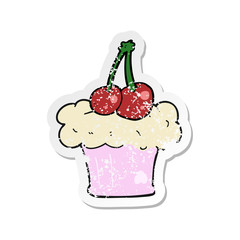 retro distressed sticker of a cartoon cupcake