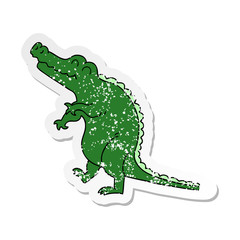 Fototapeta premium distressed sticker of a quirky hand drawn cartoon crocodile