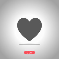 Simple heart icon. Icon under spotlight. Gray background