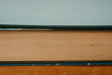 books stacked on top of each other