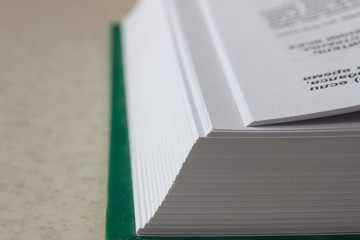 open book on white surface