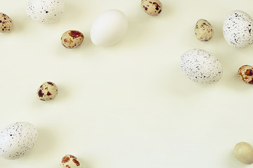 Easter. Easter eggs on a light background. Selective focus, toning, blur.