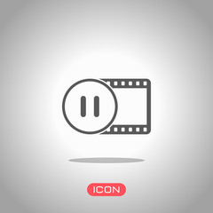 movie strip with pause symbol in circle. simple silhouette. Icon under spotlight. Gray background