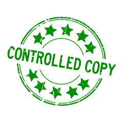 Grunge green controlled copy word with star icon round rubber seal stamp on white background