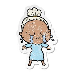distressed sticker of a cartoon crying old lady