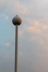 Low angle sphere white water storage tank.