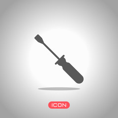 Simple silhouette of screwdriver. Icon under spotlight. Gray background