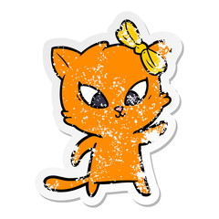 distressed sticker of a cartoon cat